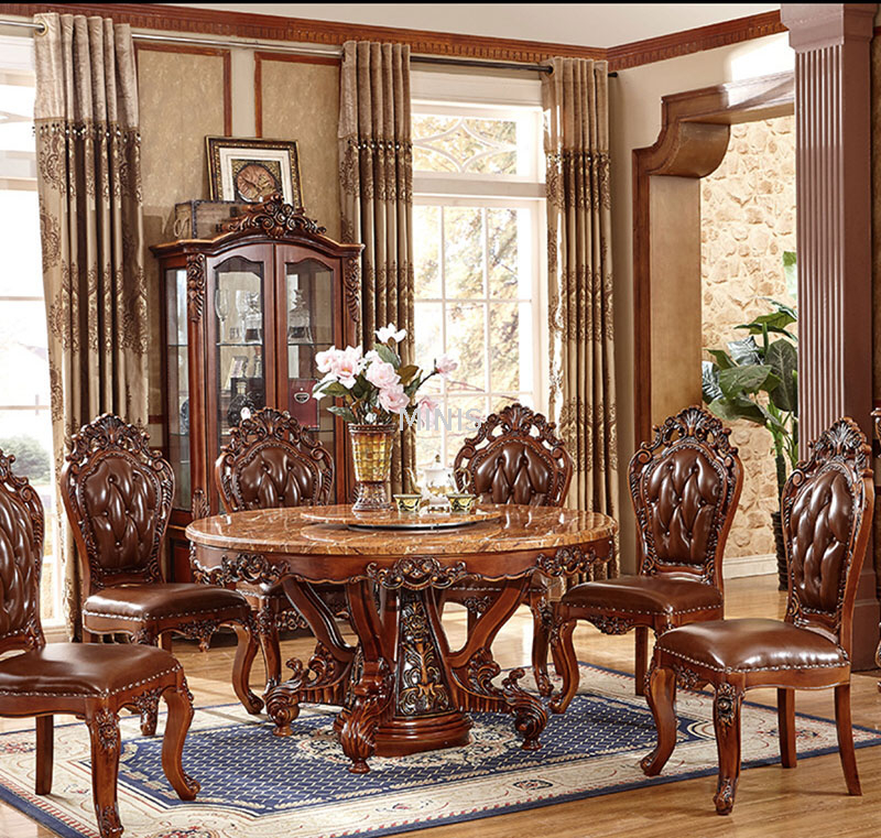 Mesa de comedor redonda vintage de mármol y madera de roble marrón con alfombra