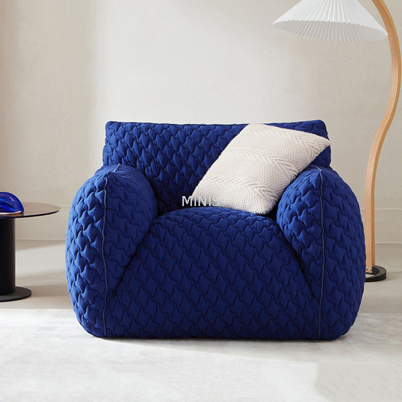 Sala de estar o dormitorio cómoda silla individual de tela azul